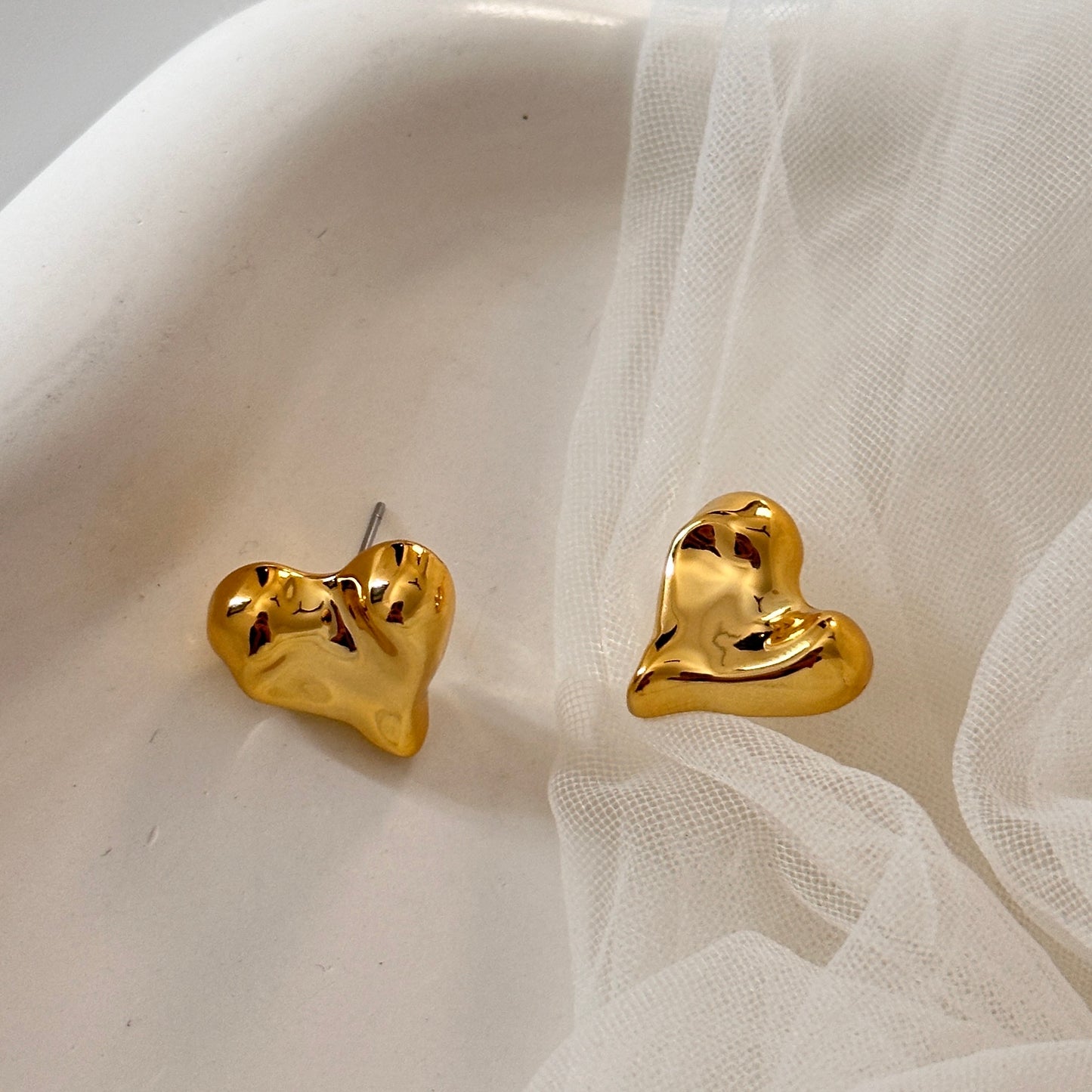 Small puffy heart studs