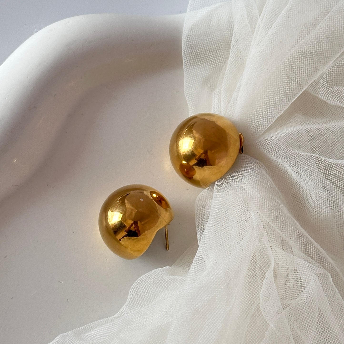 Golden sphere studs