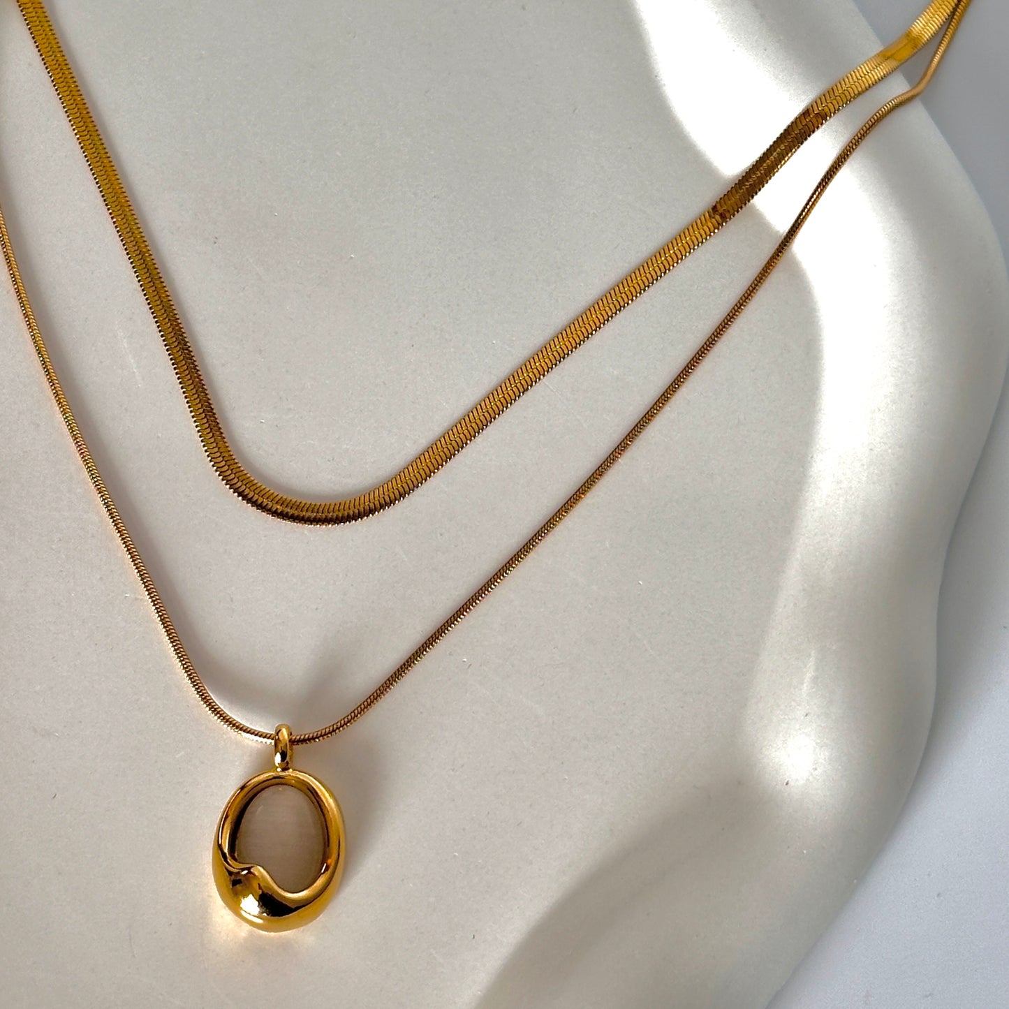 Golden eclipse necklace